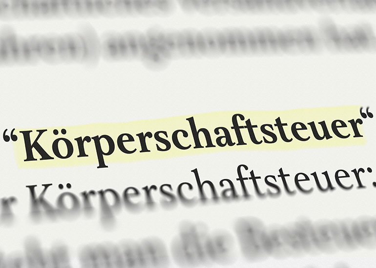 Auszug aus einem Textabschnitt, der Begriff "Körperschaftsteuer" ist hervorgehoben.